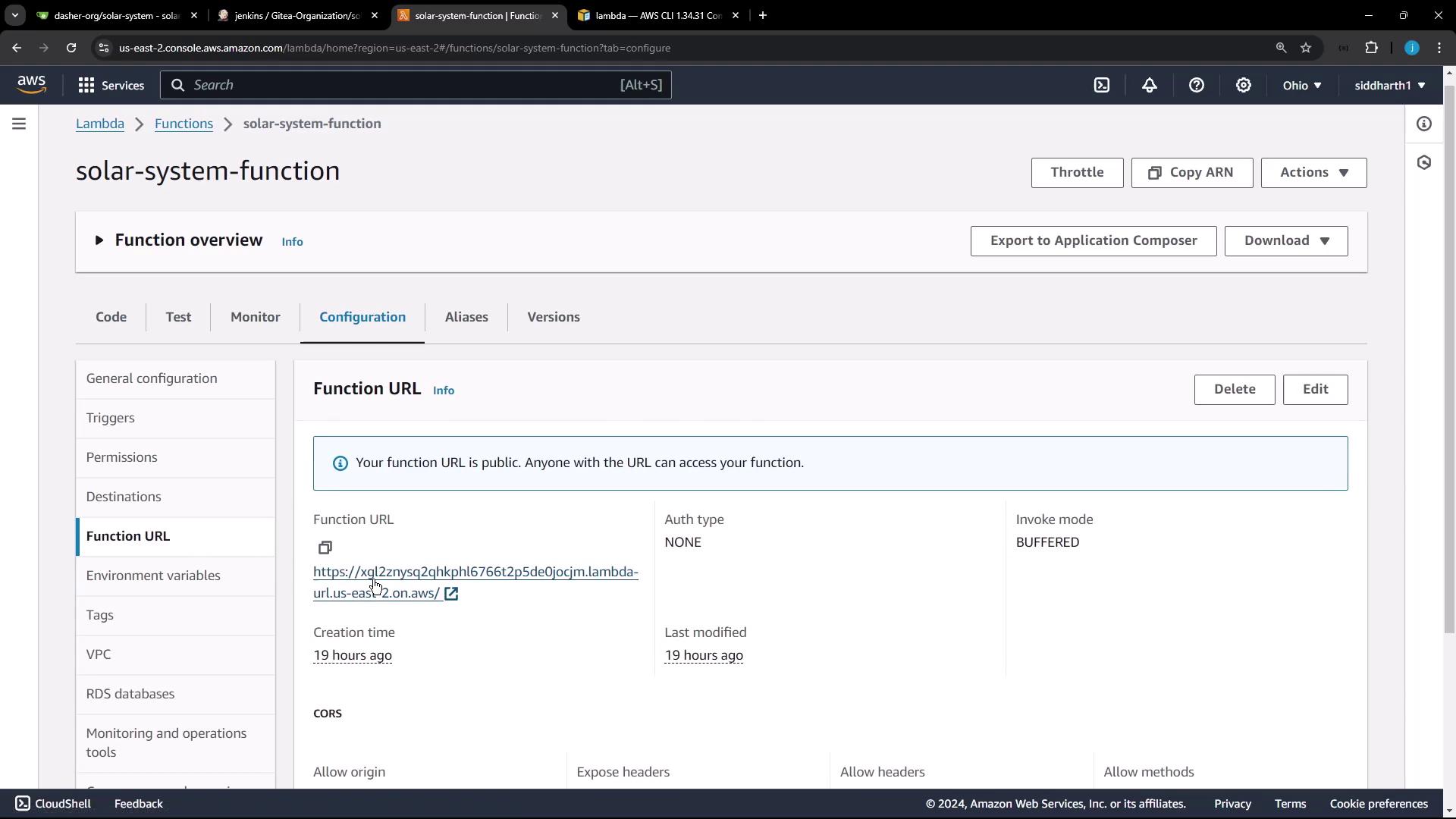 The image shows an AWS Lambda console page for a function named "solar-system-function," displaying its configuration details, including a public function URL.