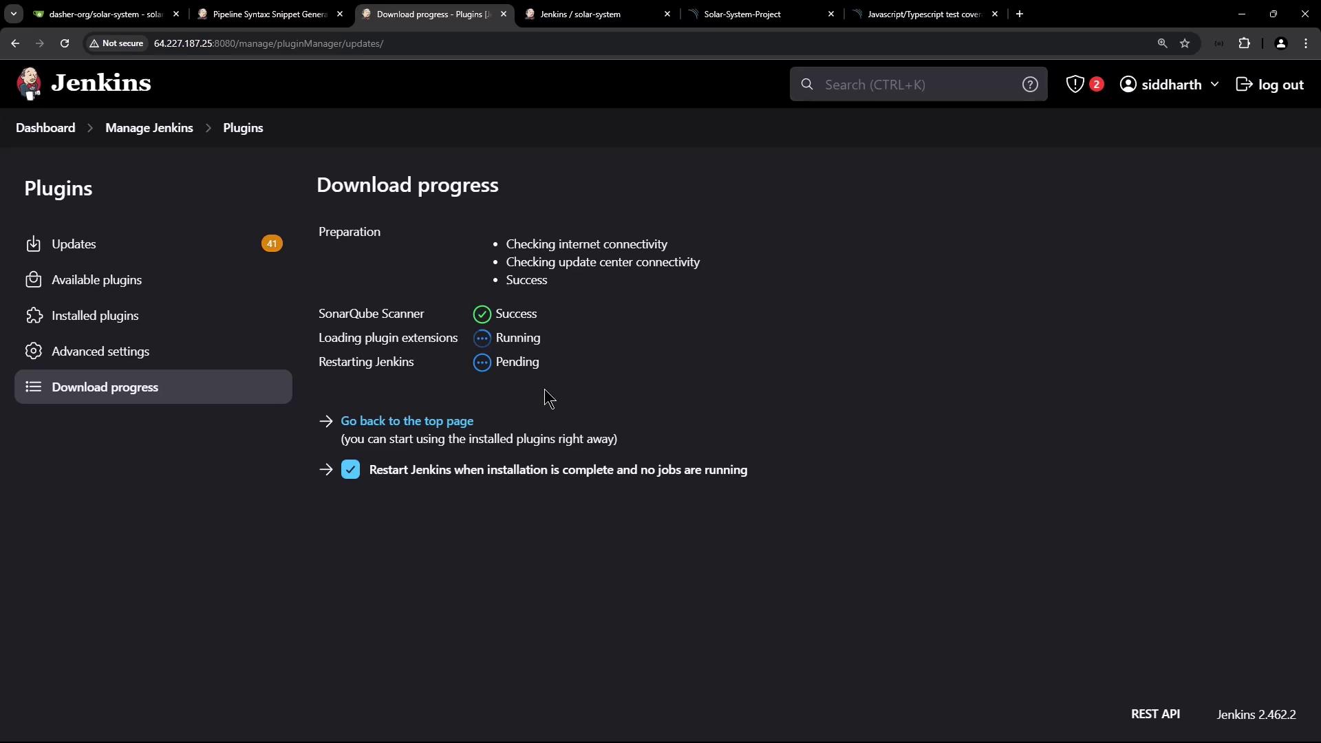 The image shows a Jenkins interface displaying the download progress of plugins, with statuses for SonarQube Scanner and other tasks.