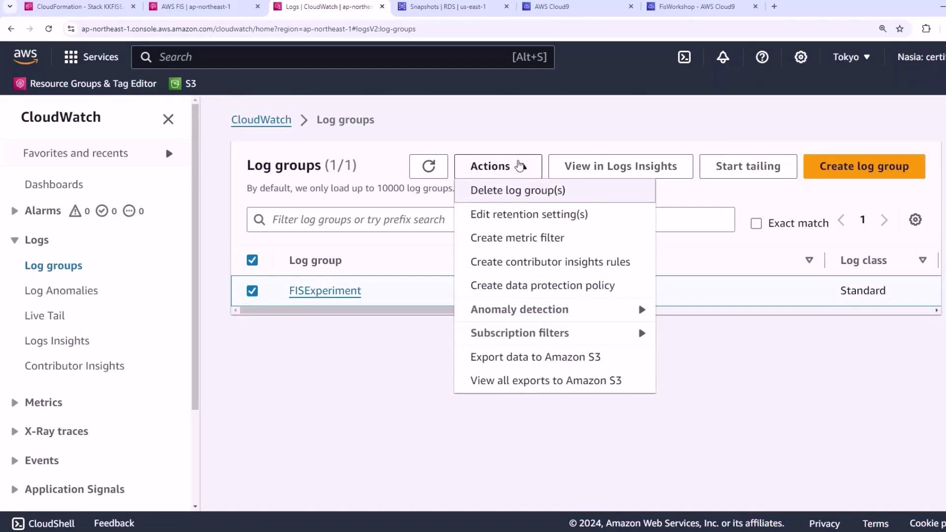 The image shows an AWS CloudWatch interface with a dropdown menu under "Actions" for managing log groups, including options like deleting log groups and creating metric filters.