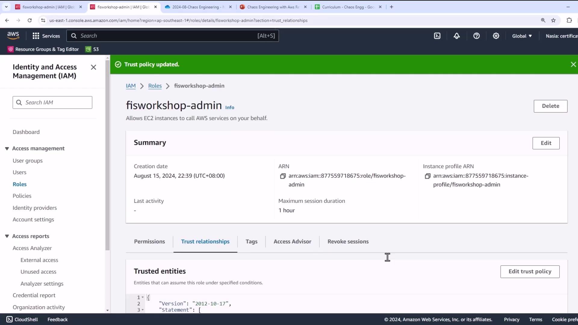 The image shows an AWS Identity and Access Management (IAM) console screen for the role "fisworkshop-admin," displaying its summary details and trust relationships.