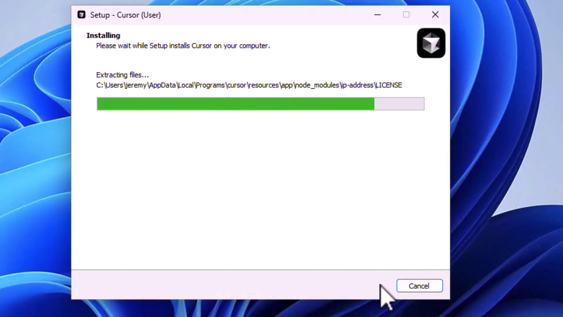 The image shows a software installation window for "Cursor," with a progress bar indicating the extraction of files. A "Cancel" button is visible at the bottom.