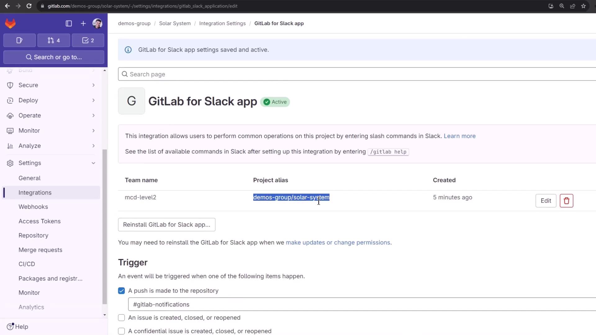 The image shows the GitLab integration settings for a Slack app, indicating that the integration is active and configured to trigger notifications when a push is made to the repository.