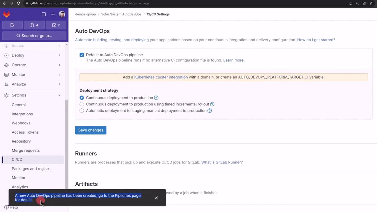 The image shows a GitLab CI/CD settings page for Auto DevOps, with options for deployment strategies and a notification about a new pipeline creation.