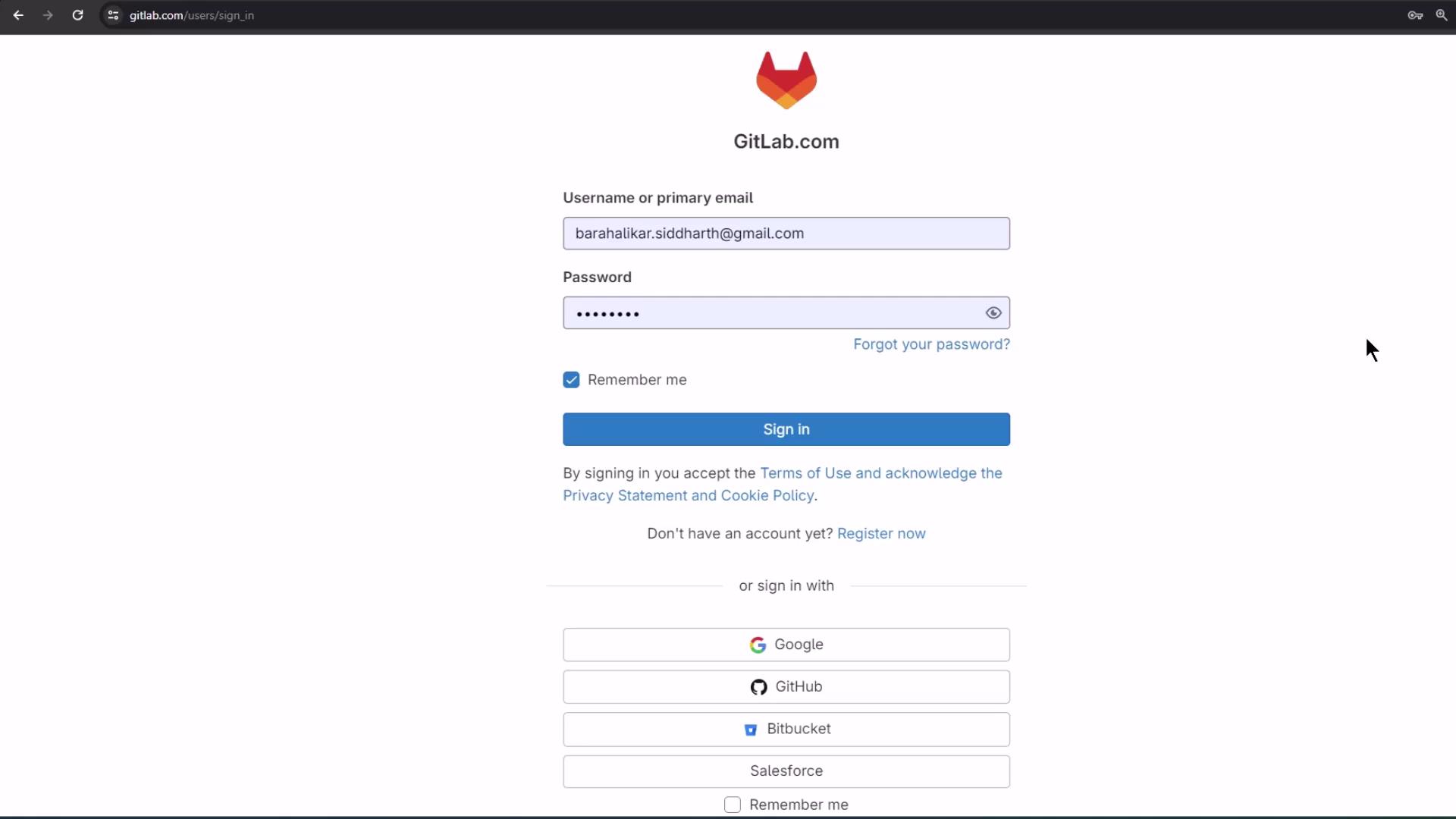 The image shows a GitLab login page where a user can sign in with a username or email and password, or use alternative sign-in options like Google, GitHub, Bitbucket, or Salesforce.
