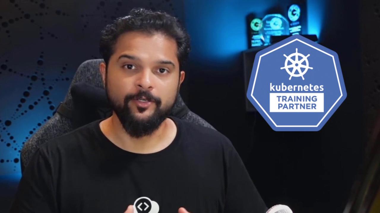 A person is speaking in front of a backdrop with a "Kubernetes Training Partner" logo, suggesting a focus on Kubernetes training or certification.