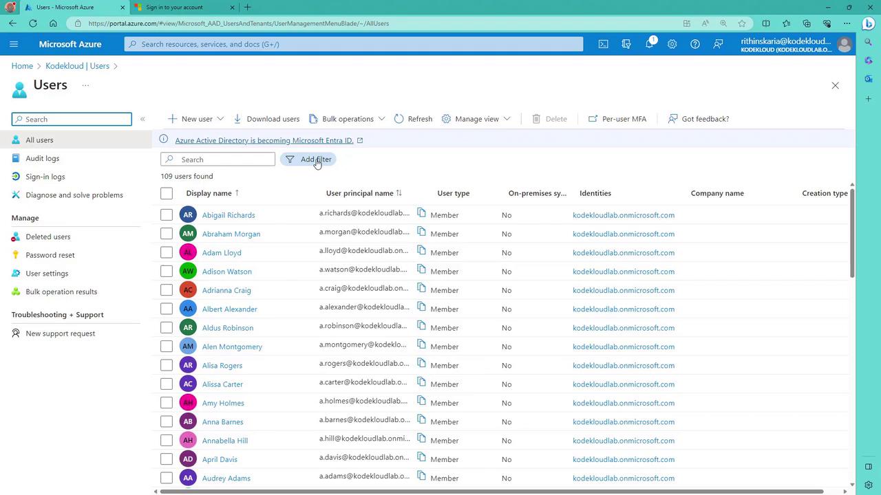 The image shows a Microsoft Azure portal displaying a list of users with details such as display name, user principal name, and user type. The interface includes options for managing users, such as adding filters and performing bulk operations.