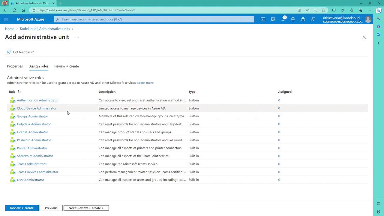 The image shows a Microsoft Azure portal page for adding an administrative unit, specifically displaying a list of administrative roles with descriptions, types, and assignment counts.