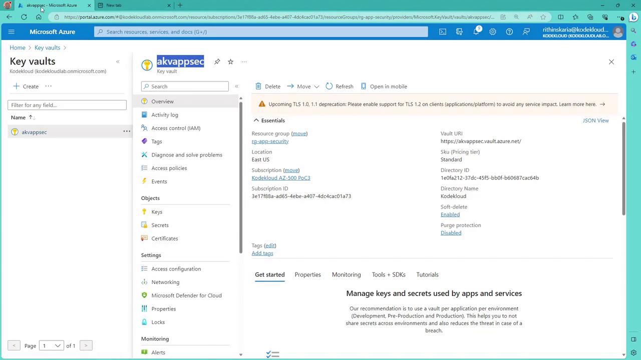 The image shows a Microsoft Azure portal interface displaying details of a Key Vault named "akvappsec." It includes information such as resource group, location, subscription ID, and settings related to keys and secrets management.