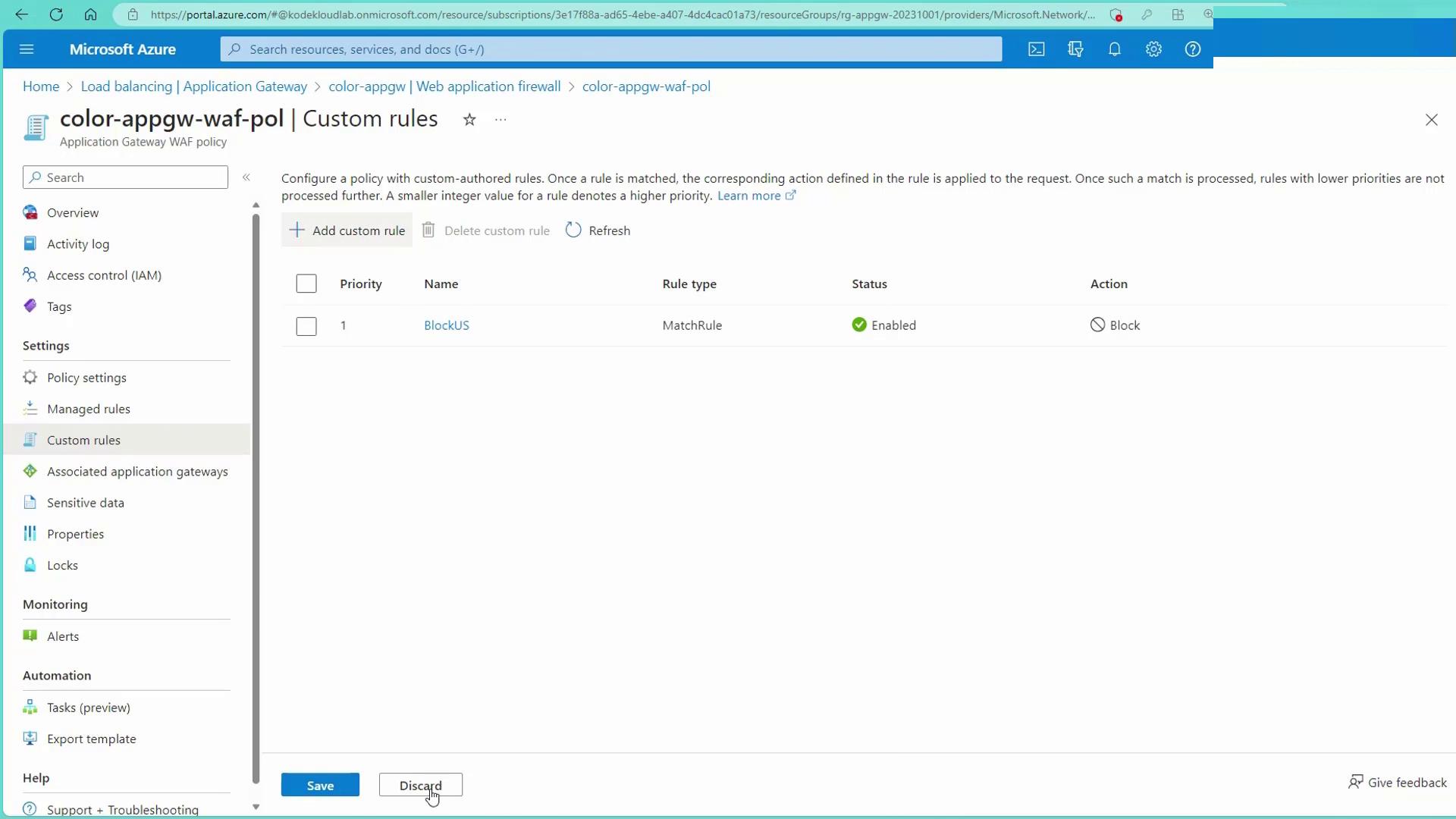 The image shows a Microsoft Azure portal page for configuring custom rules in an Application Gateway WAF policy. It displays a rule named "BlockUS" with a priority of 1, which is enabled and set to block.