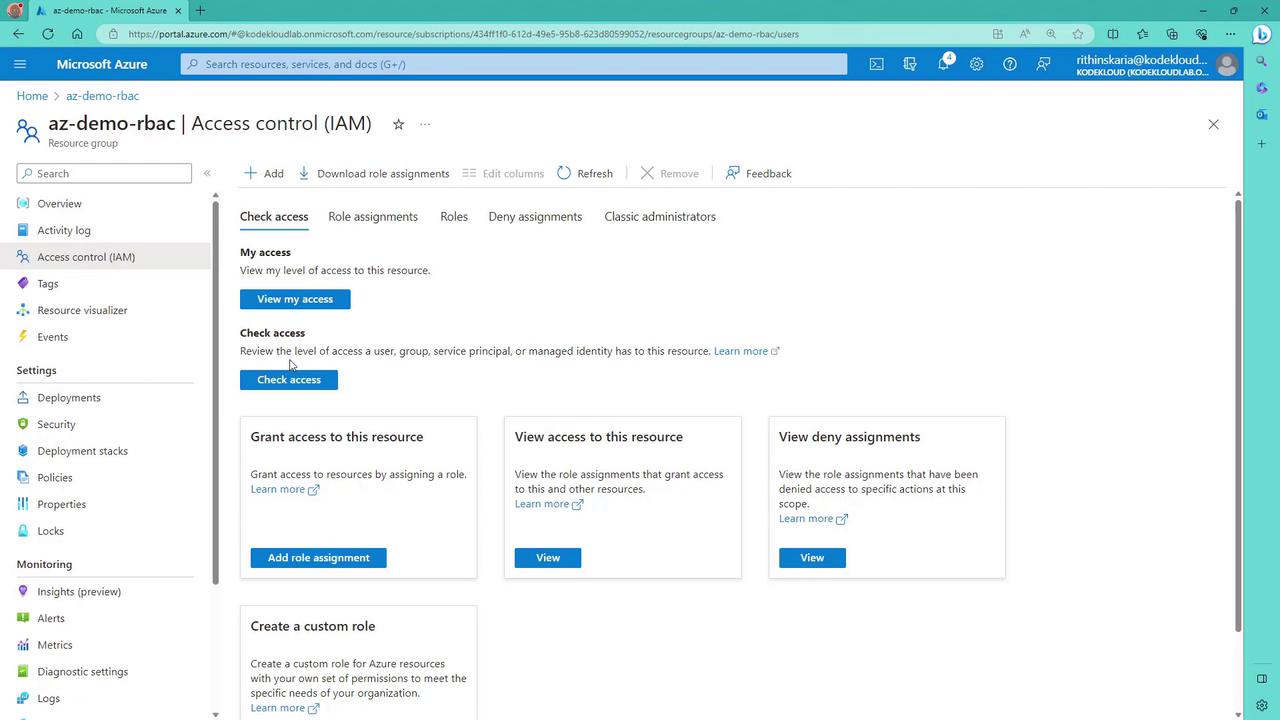 The image shows the Microsoft Azure portal, specifically the Access Control (IAM) section for a resource group named "az-demo-rbac." It displays options for checking access, granting access, viewing access, and managing role assignments.