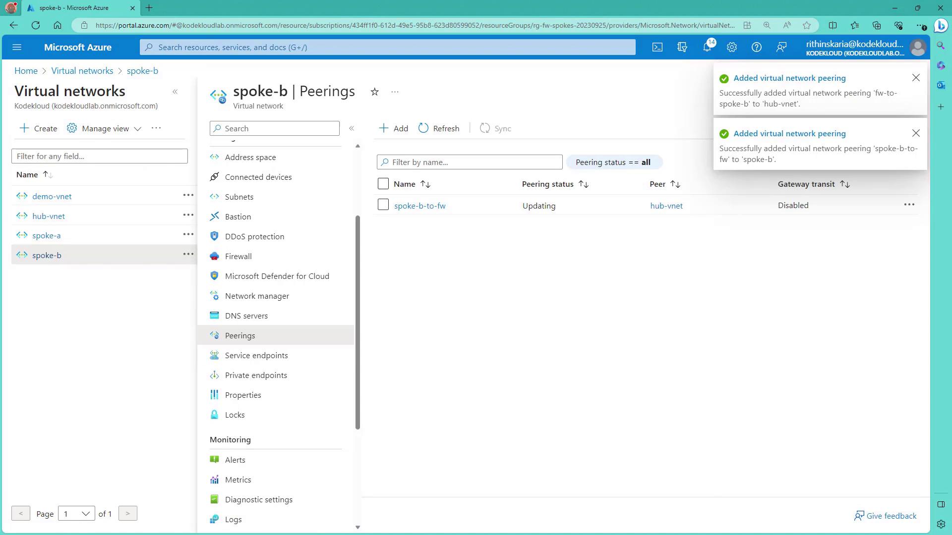 The image shows a Microsoft Azure portal interface displaying the "Peerings" section for a virtual network named "spoke-b." Notifications indicate successful addition of virtual network peerings.