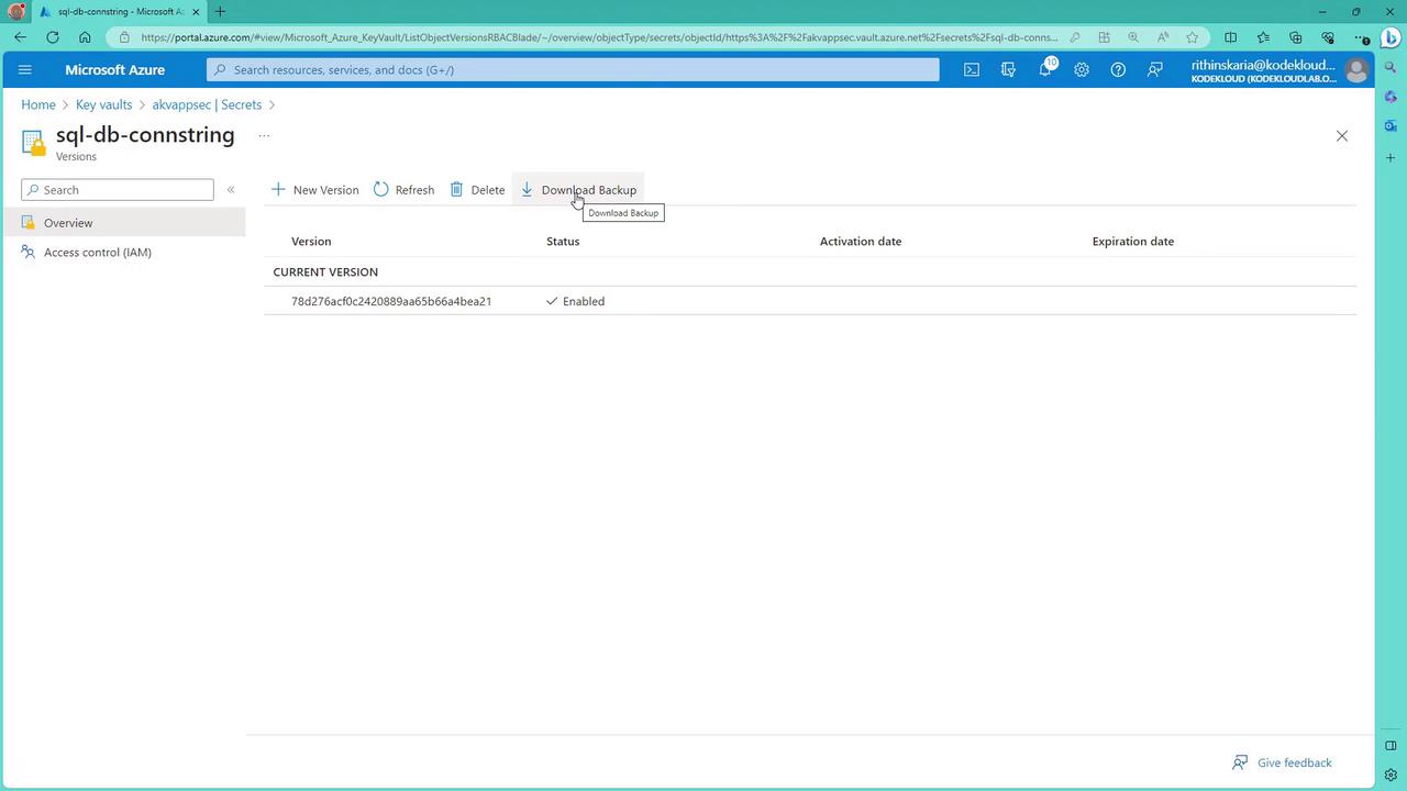The image shows a Microsoft Azure Key Vault interface displaying a secret named "sql-db-connstring" with its current version enabled. There are options to create a new version, refresh, delete, or download a backup.