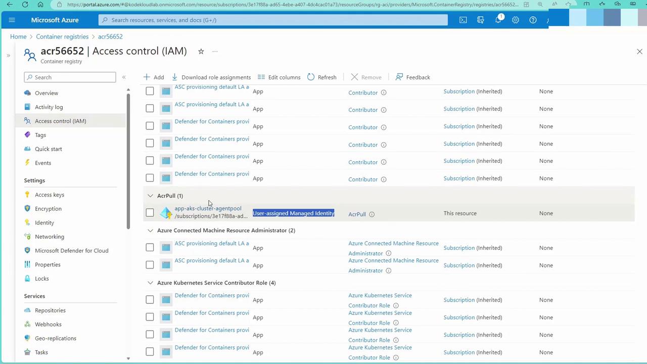The image shows the Microsoft Azure portal, specifically the Access Control (IAM) section for a container registry, displaying a list of role assignments and permissions.
