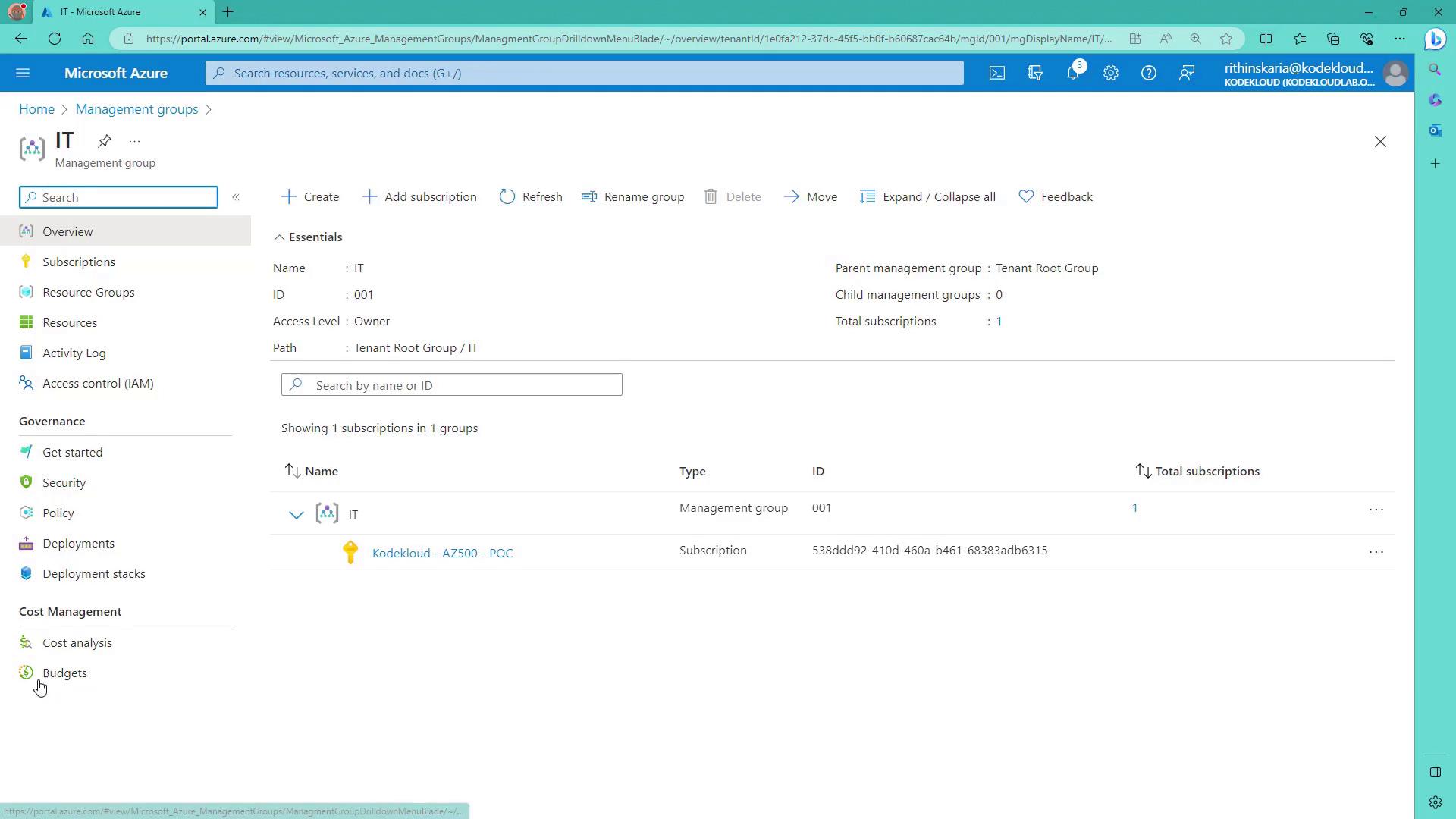 The image shows a Microsoft Azure portal interface displaying details of a management group named "IT," including its ID, access level, and associated subscriptions. The sidebar includes options for subscriptions, resource groups, and governance features like security and policy.