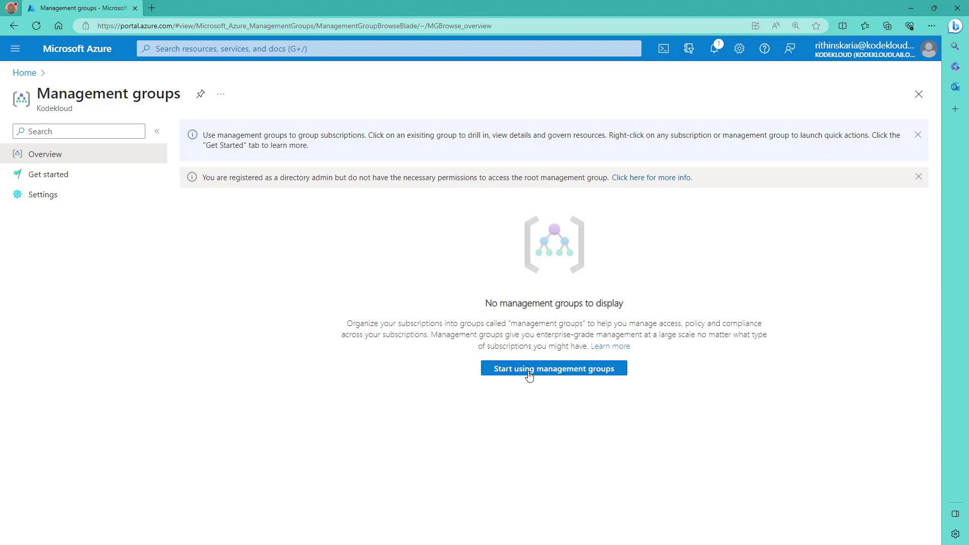 The image shows a Microsoft Azure portal page for managing groups, indicating that there are no management groups to display. It includes options to start using management groups and provides navigation links on the left.