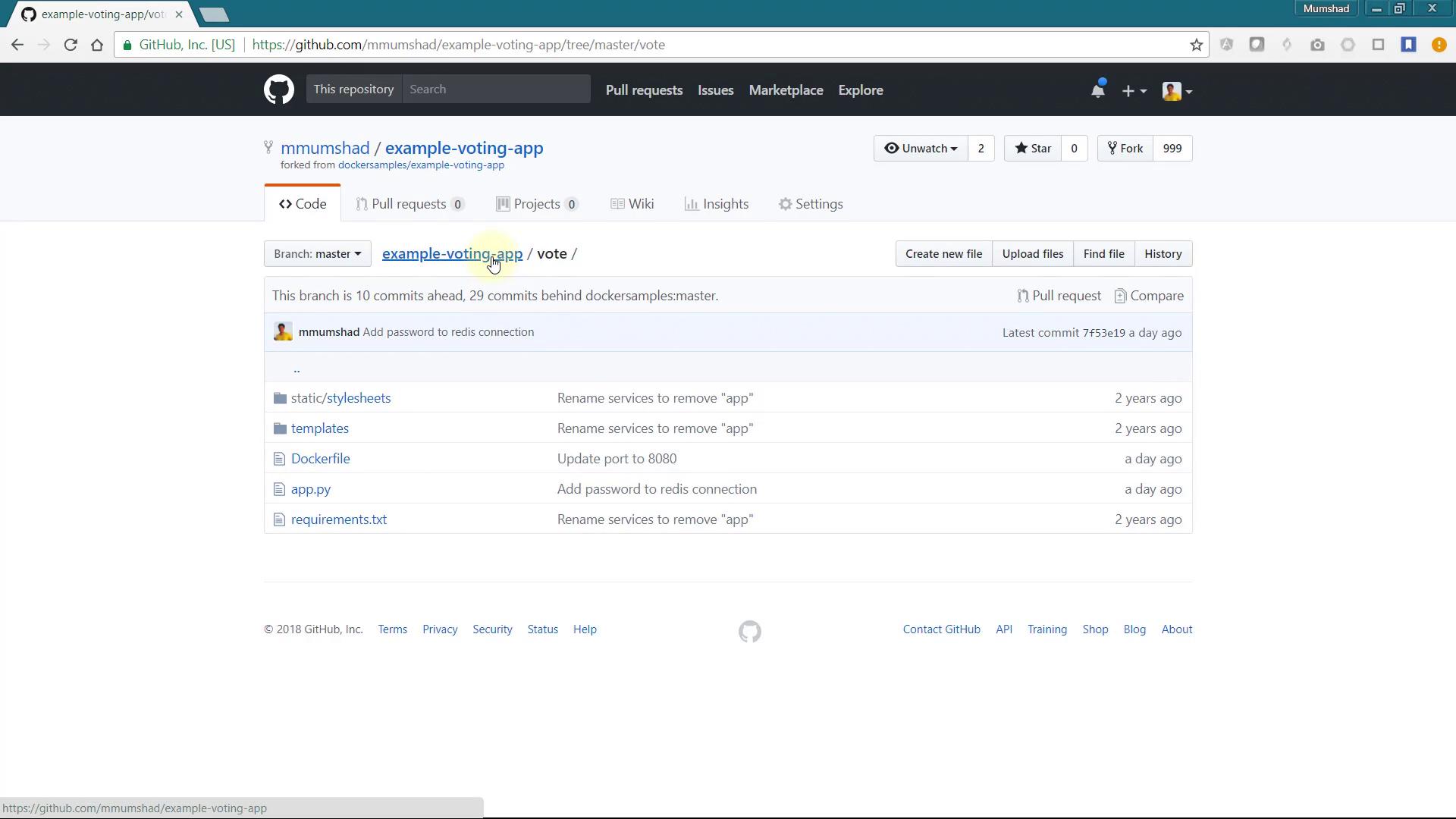 The image shows a GitHub repository page for "example-voting-app" with a list of files and directories, including "Dockerfile" and "app.py". The branch is 10 commits ahead and 29 commits behind the master branch of the original repository.